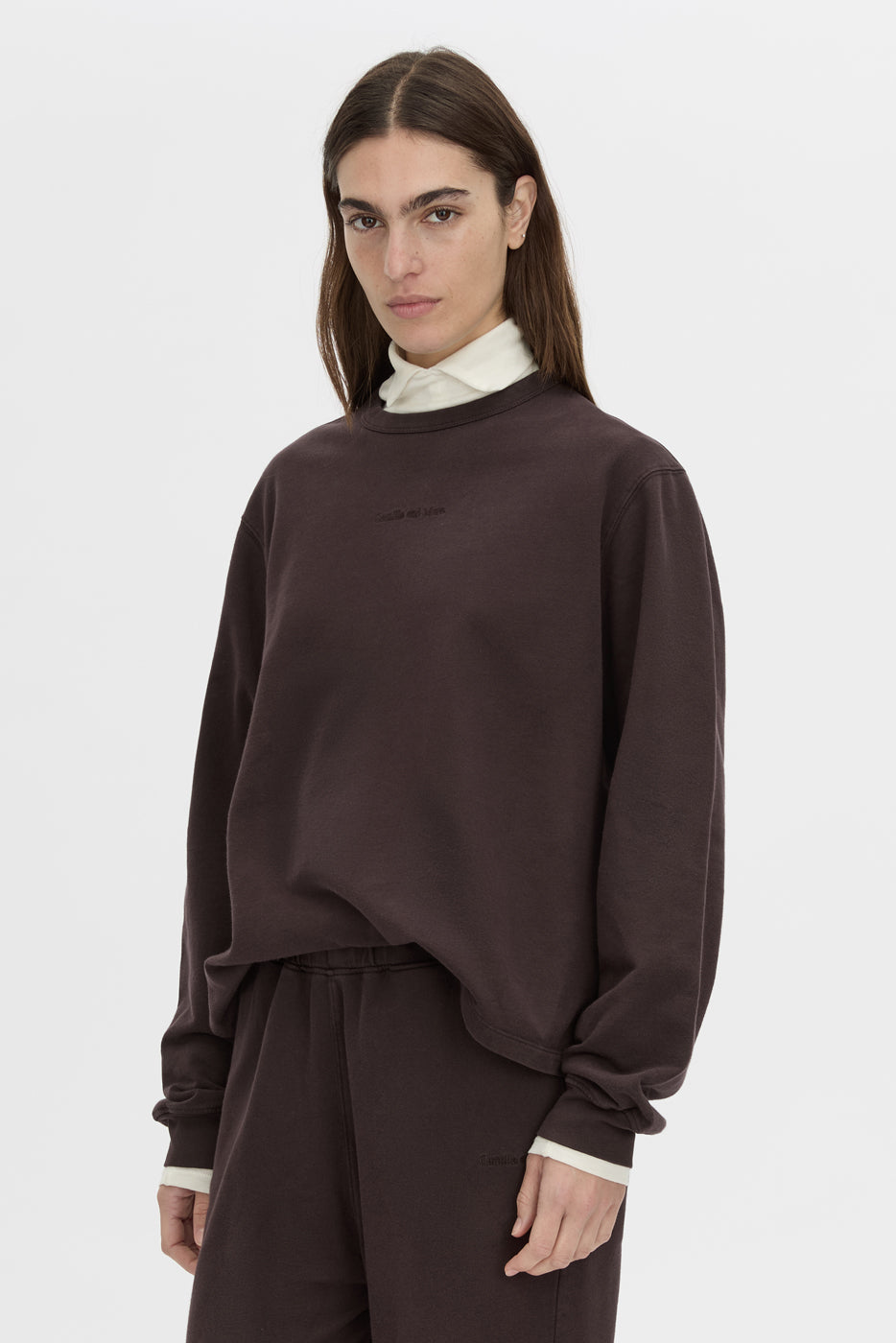 Cropped view CAMILLA AND MARC Thome Emb Relaxed Track Top in garment-dyed hickory.