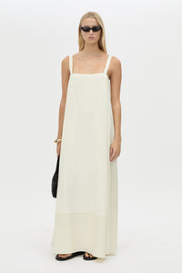 Front view CAMILLA AND MARC Tove Maxi Dress in Cream with a sleeveless silhouette and contrasting satin trim. 