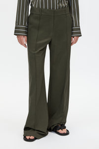 Cropped view CAMILLA AND MARC Una Straight Leg Trouser in Emerald Green with front pintucks, and a tailored waistband.