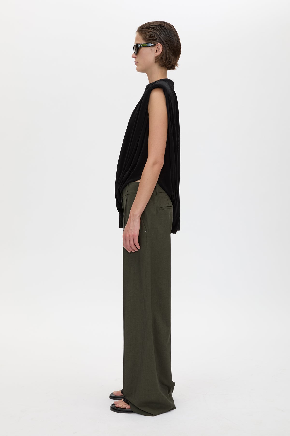Side view CAMILLA AND MARC Una Straight Leg Trouser in Emerald Green with front pintucks, and a tailored waistband.