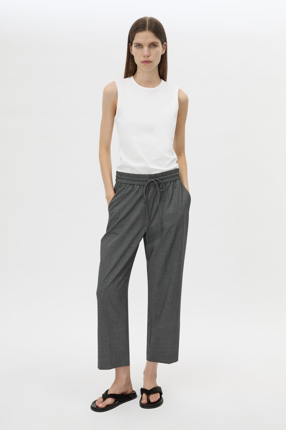Front view CAMILLA AND MARC Vector Crop Pant in Charcoal Grey with soft suiting fabrication.