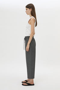 Side view CAMILLA AND MARC Vector Crop Pant in Charcoal Grey with soft suiting fabrication.
