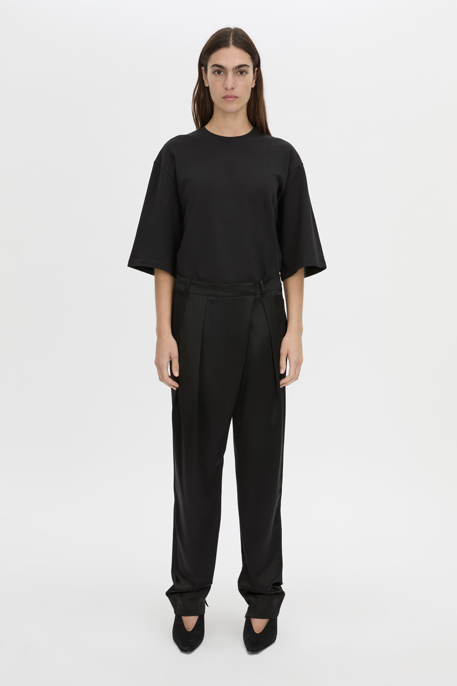 Front view CAMILLA AND MARC Velin Pant in black with pleated bow‑leg design.