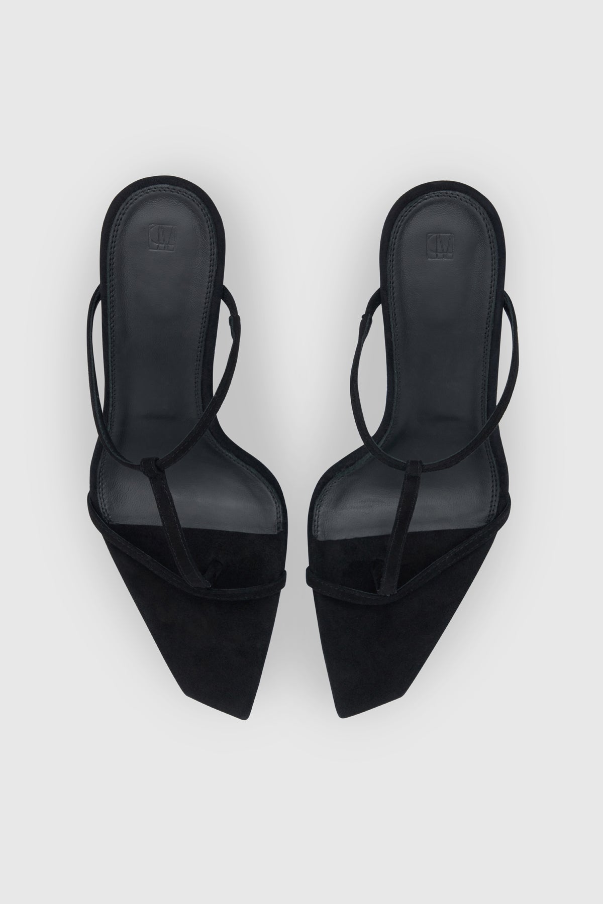 Top view CAMILLA AND MARC Wave Mule in black soft goat suede with heeled sandal design.