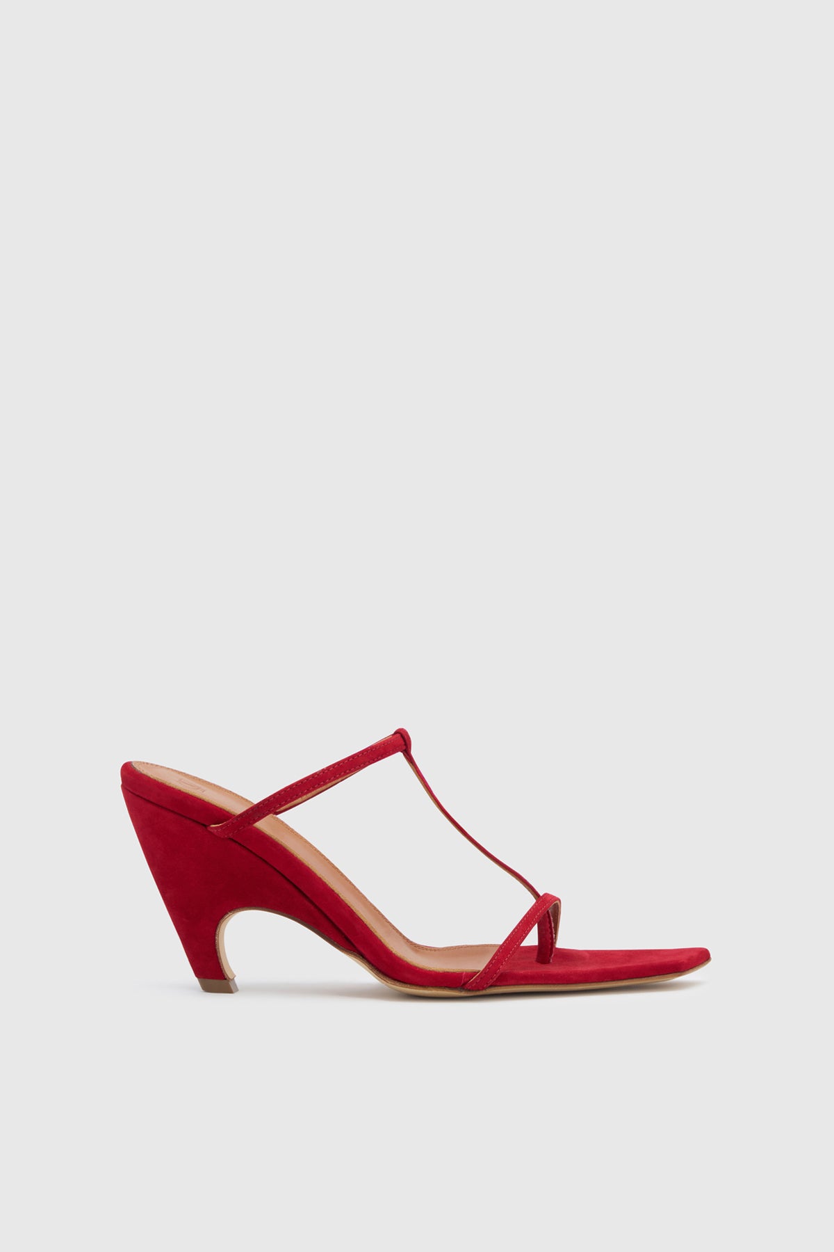 Side view CAMILLA AND MARC Wave Mule in red soft goat suede with heeled sandal design.