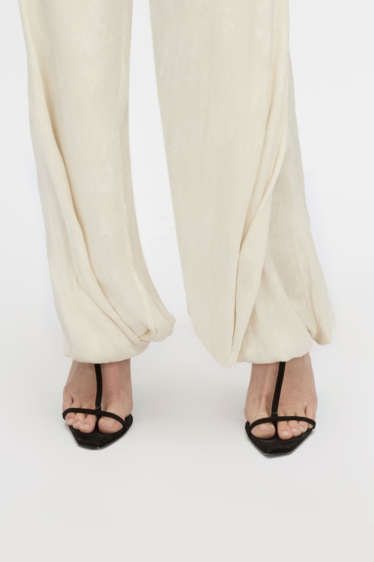 Front view CAMILLA AND MARC Wave Mule in black soft goat suede with heeled sandal design.