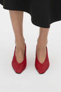 Front styled view CAMILLA AND MARC Wave Textured Pump in red laser‑cut goat leather.