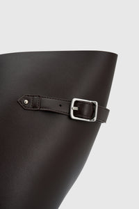 Cropped view CAMILLA AND MARC Willa Tote in Chocolate Brown with side strap and buckle detailing and magnetic button closure.