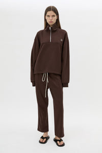 Styled view CAMILLA AND MARC Zylus straight-leg tracksuit pant in chocolate with embroidered monogram.