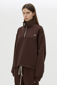 Cropped view CAMILLA AND MARC Zylus funnel neck pullover sweater in chocolate/white with contrast embroidered monogram.