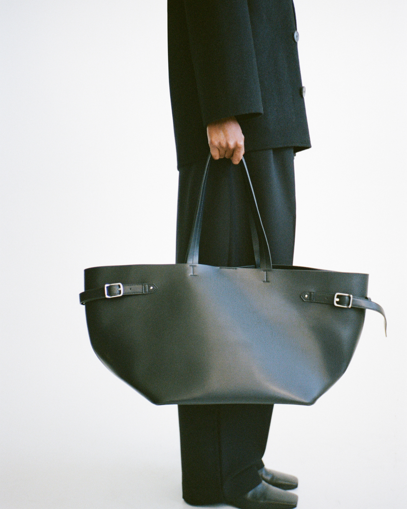 CAMILLA AND MARC PF26 - Willa Tote in Black held by handles