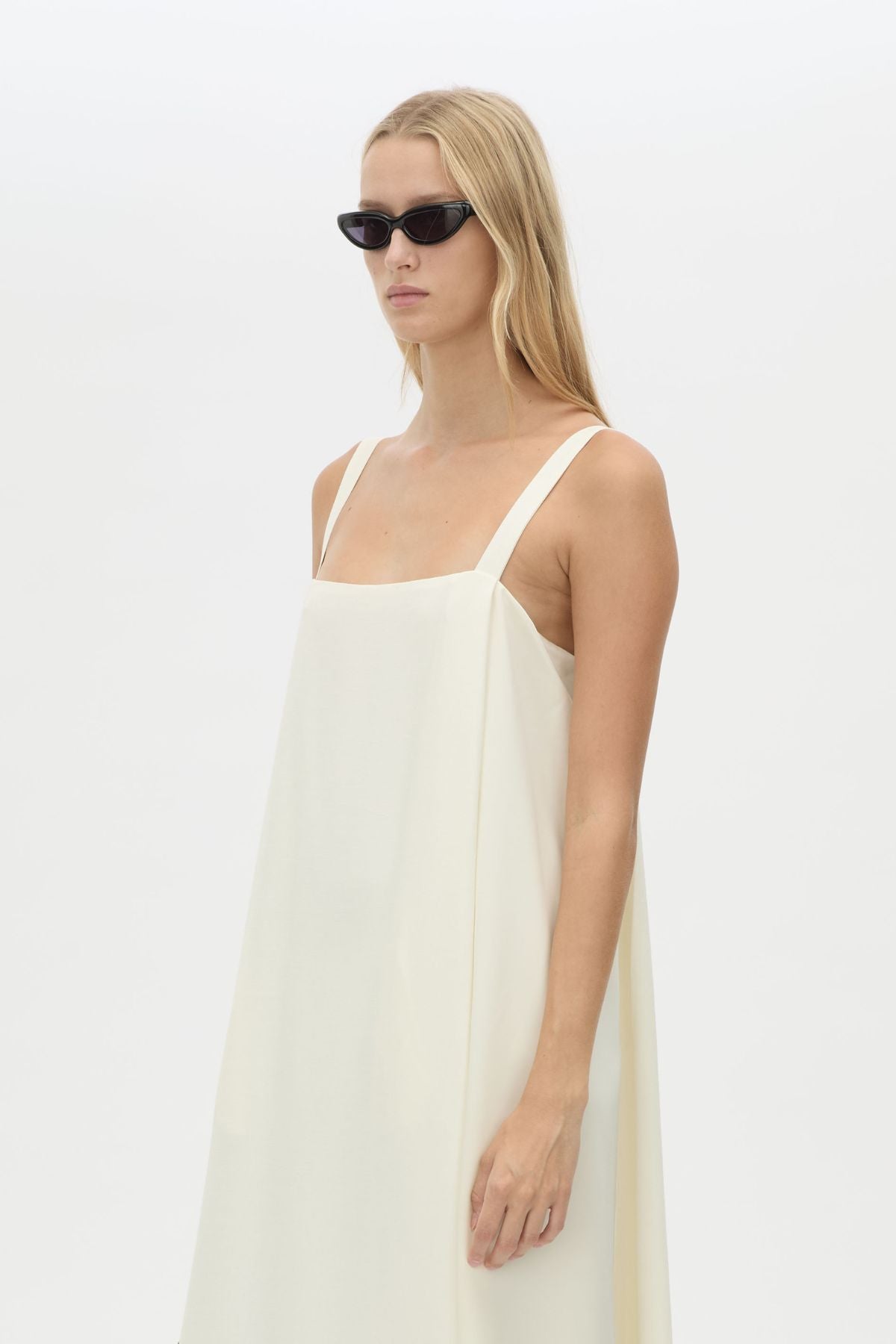Cropped view CAMILLA AND MARC Tove Maxi Dress in Cream with a sleeveless silhouette and contrasting satin trim. 