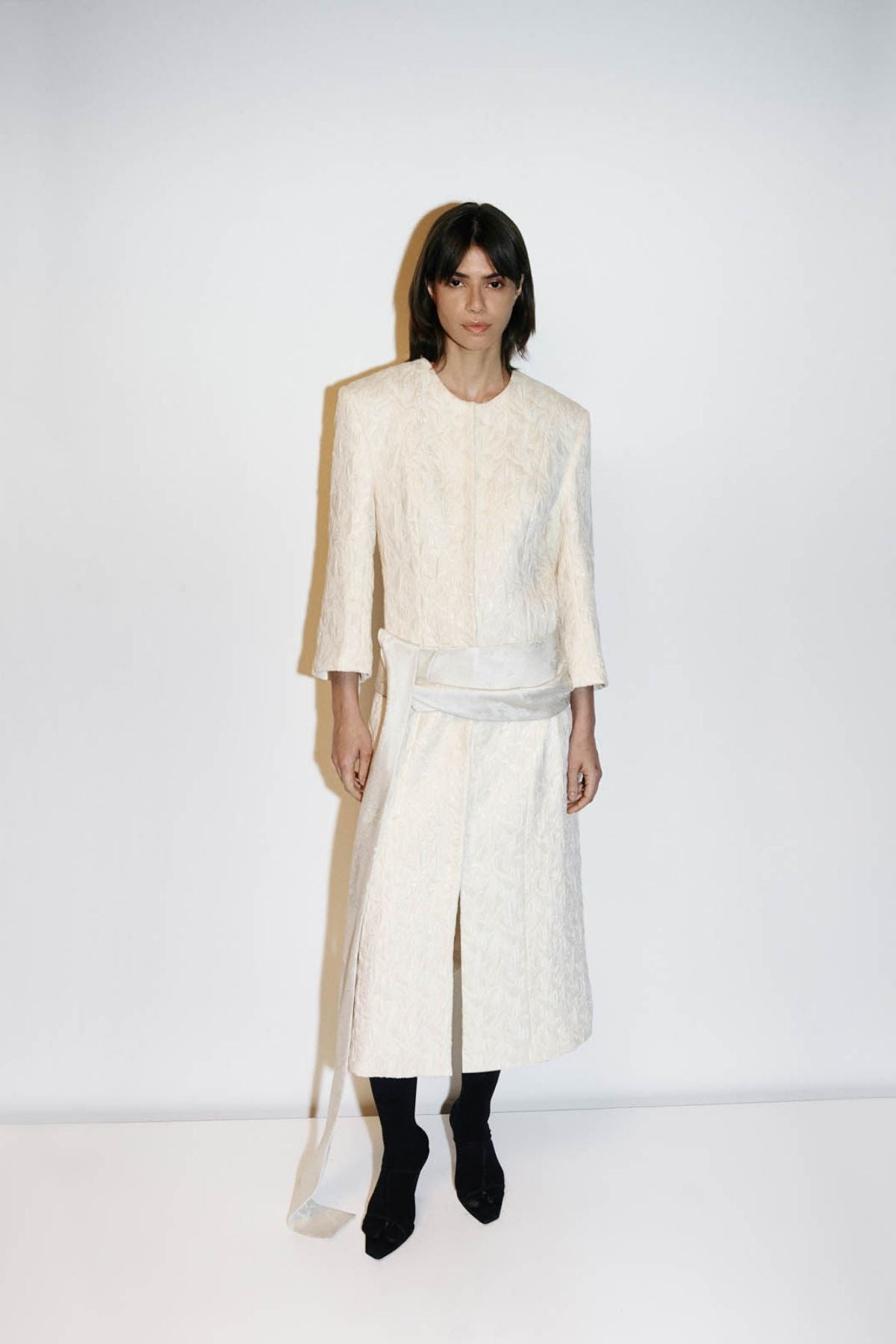 Styled campaign view CAMILLA AND MARC Gracia coat in cream.