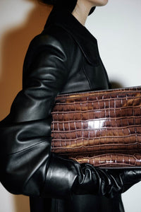 Styled campaign view CAMILLA AND MARC Mette Bag in brown croc embossed leather.
