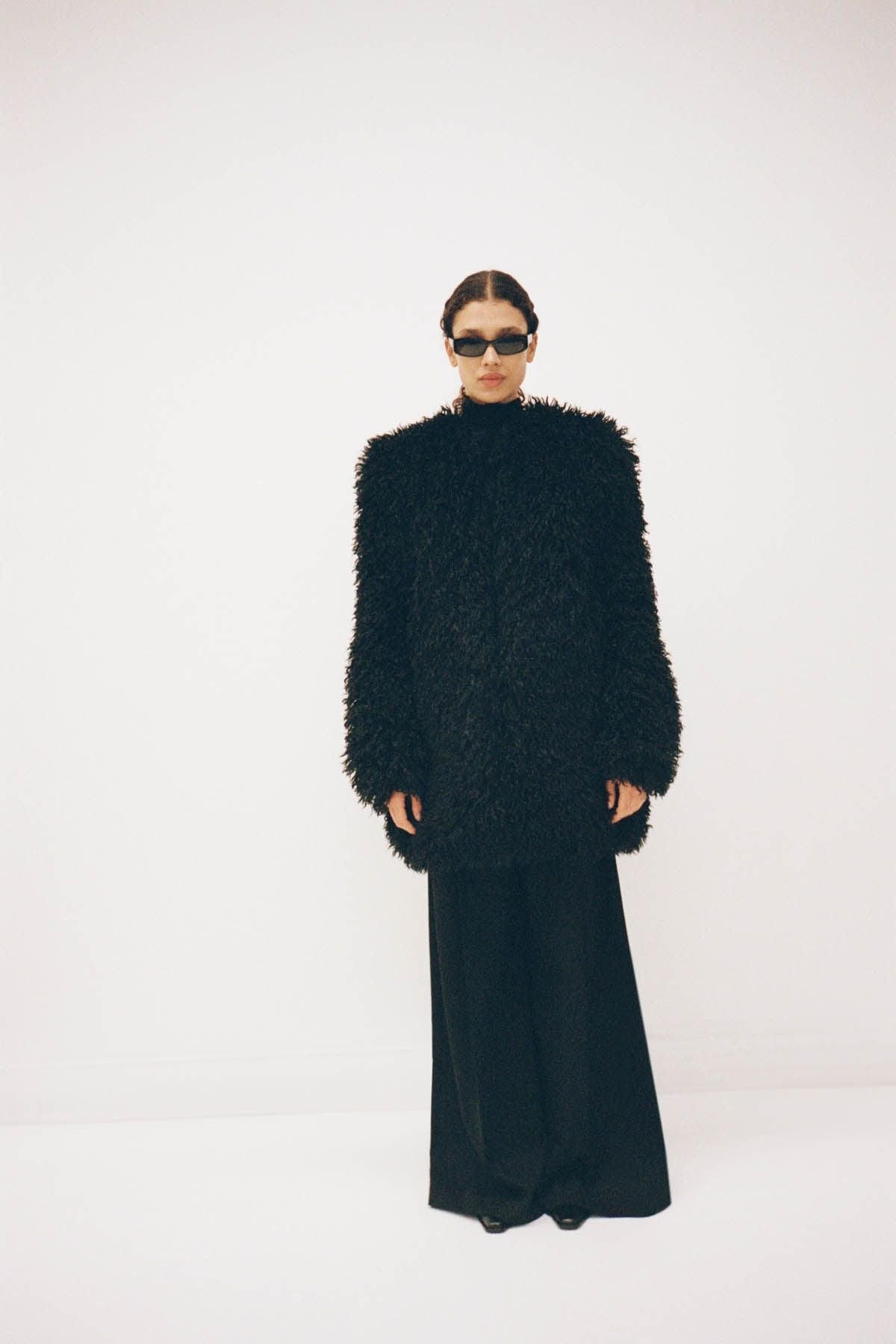 Campaign view CAMILLA AND MARC oversized Renley Short Coat in black faux‑fur.