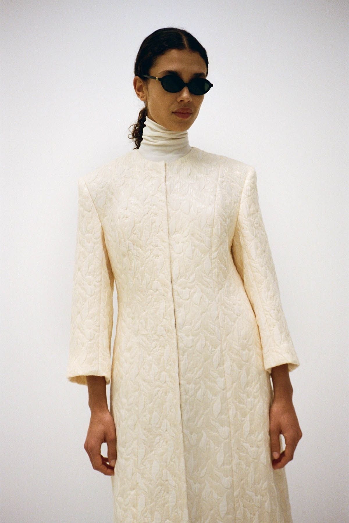 Campaign view CAMILLA AND MARC Gracia coat in cream.