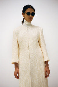 Campaign view CAMILLA AND MARC Gracia coat in cream.