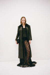 Campaign view CAMILLA AND MARC Elaris maxi skirt in black.