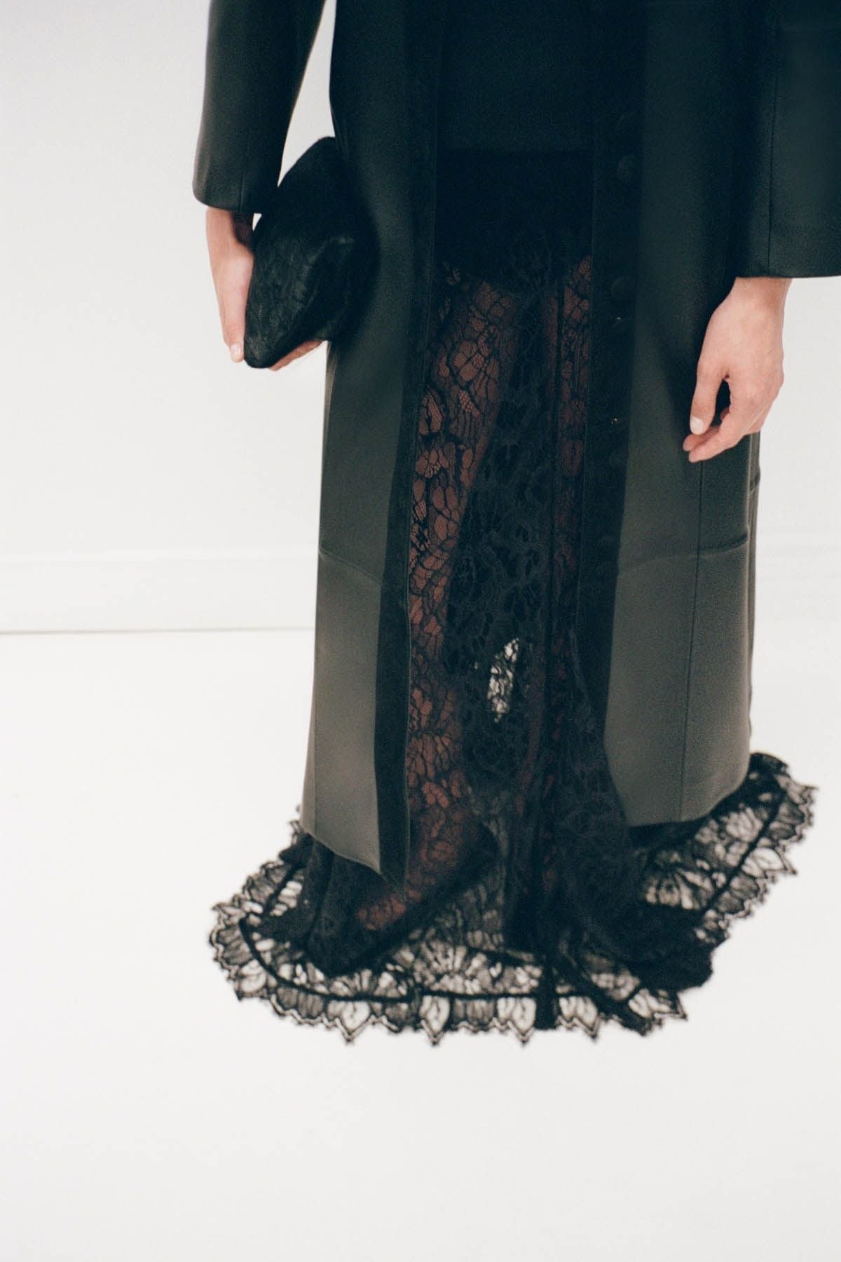Campaign styled view CAMILLA AND MARC Elaris maxi skirt in black.