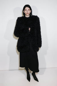 Campaign view CAMILLA AND MARC oversized Renley Short Coat in black faux‑fur.