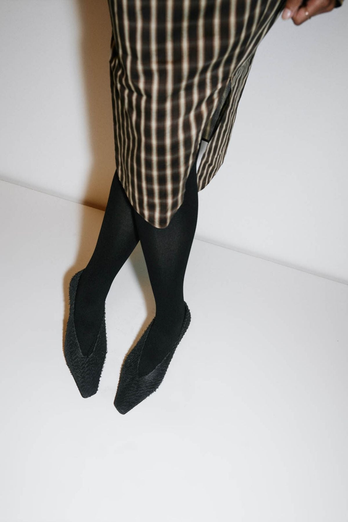 Styled campaign view CAMILLA AND MARC Mannix midi skirt in chocolate check.
