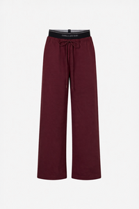 Ghost view CAMILLA AND MARC Dia Elastic Detail Pant in Burgundy with logo detail.