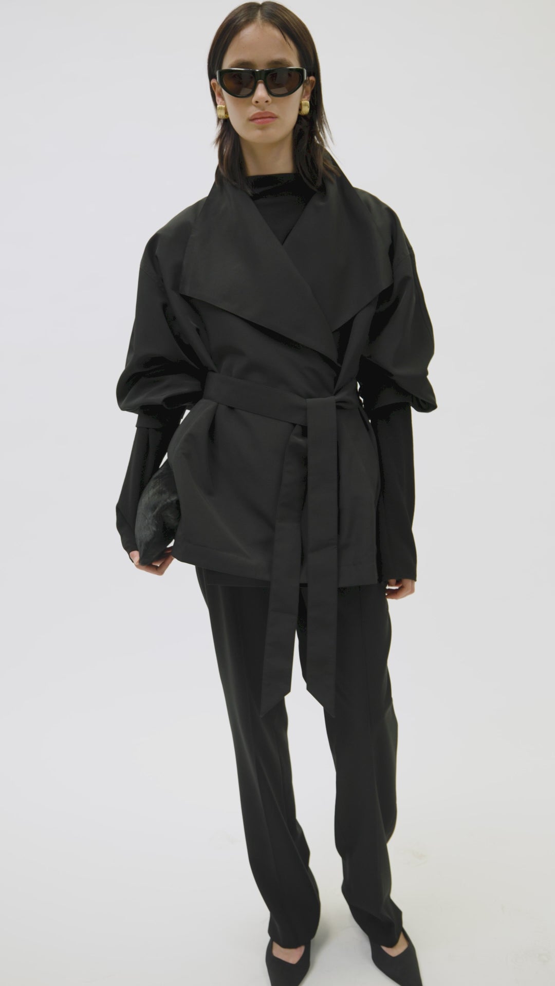 Styled video CAMILLA AND MARC Nasir Cropped Jacket in Black with high‑neck, double‑breasted wrap design.