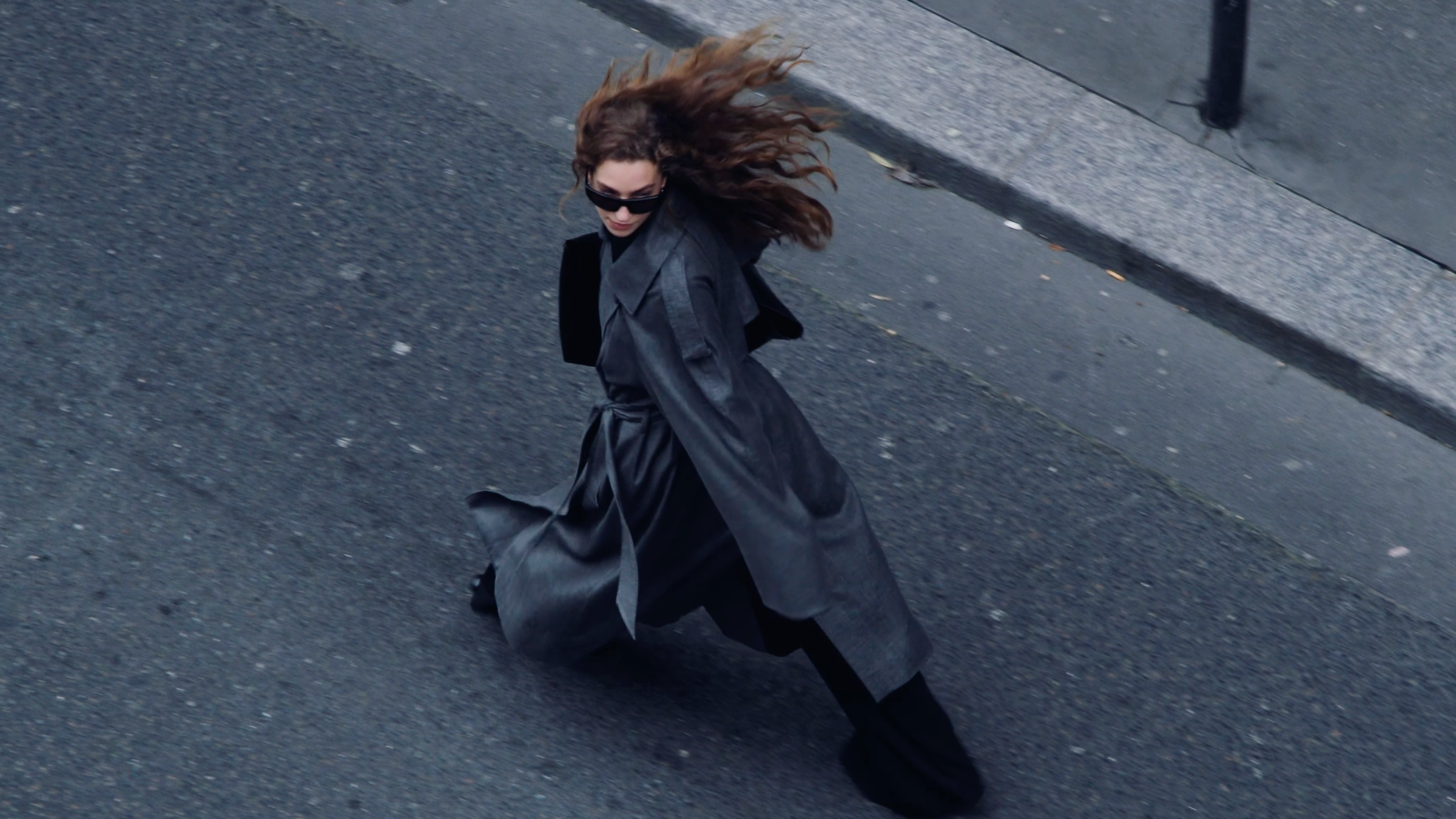 CAMILLA AND MARC Seasonal Sale -Model wearing Ember Trench Coat in grey with waist belt.
