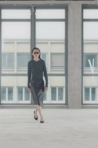 Runway video CAMILLA AND MARC Dawn Leather Skirt in Black Brown with a wrap midi silhouette.