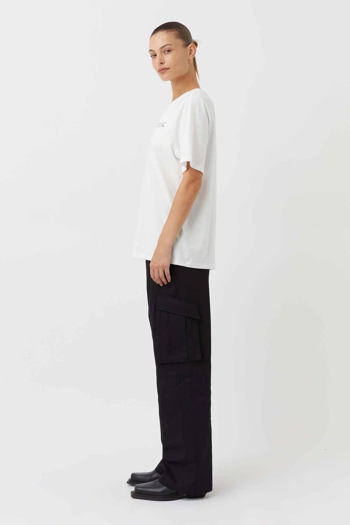CAMILLA AND MARC Asher Cotton Logo Tee in White.

The Asher Tee seamlessly blends comfort and style, making it a perfect choice for any casual occasion. This tee is crafted from premium quality cotton and promises a soft and breathable feel, ensuring all-day comfort. The relaxed fit and logo elevate this tee making it an instant wardrobe hero.